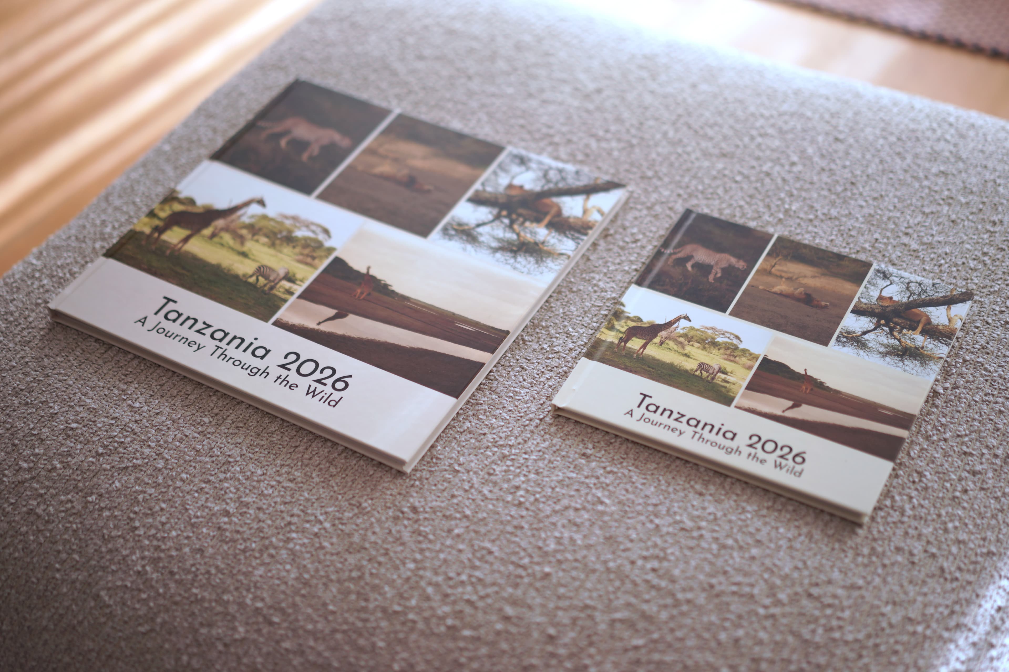 A photobook resting on a pouf in a sunlit living room
